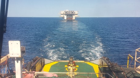 View from vessel at topsides on barge